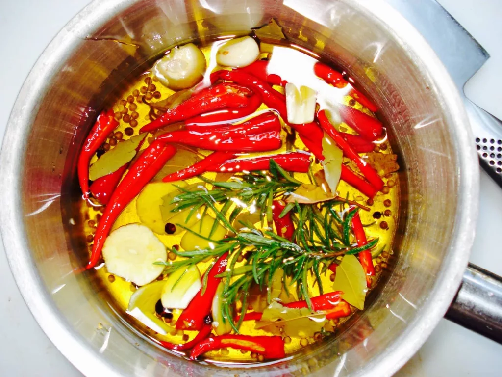 The Hirshon Olio Santo (Spicy "Holy" Oil) 13 Hot pot - Thai cuisine