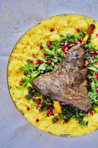 The Hirshon Omani Slow-Cooked Leg of Lamb With Spiced Rice - لشواء العماني