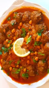 The Hirshon Algerian Garlic Meatballs in Spicy Red Garlic Sauce - مثوم مع صلصة الثوم الأحمر The Hirshon Algerian Garlic Meatballs in Spicy Red Garlic Sauce - مثوم مع صلصة الثوم الأحمر