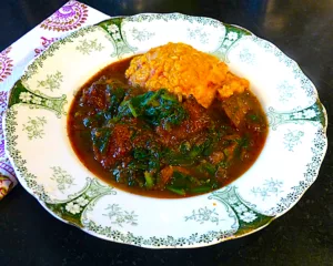 The Hirshon Togolese Spiced Beef Stew With Spinach And Dumplings - Gboma Dessi