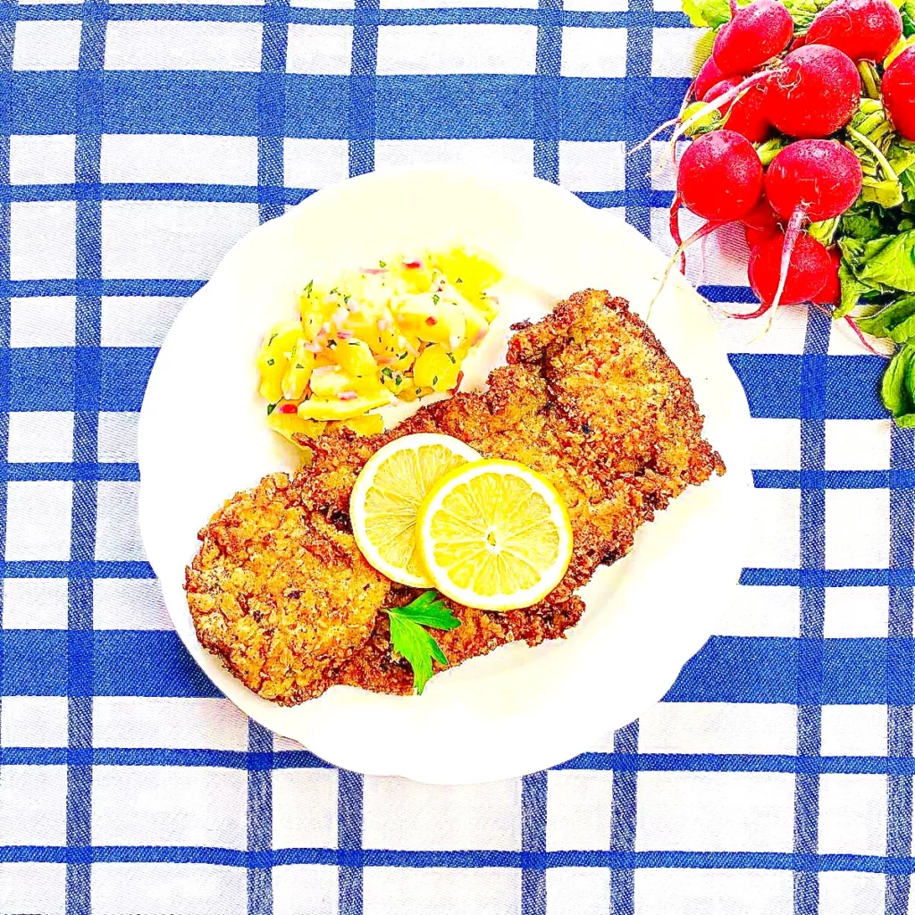 The Hirshon Munich Schnitzel with Swabian Potato Salad via Finland - Münchner Schnitzel mit Schwäbischem Kartoffelsalat über Finnland The Hirshon Munich Schnitzel with Swabian Potato Salad via Finland - Münchner Schnitzel mit Schwäbischem Kartoffelsalat über Finnland